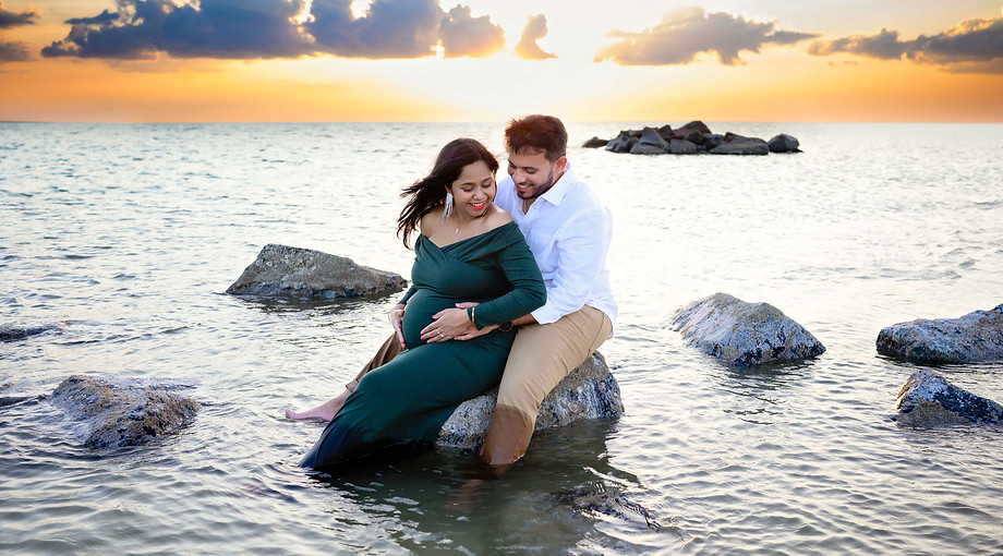 Maternity sunset photoshoot in the water at the beach in Clearwater, Florida