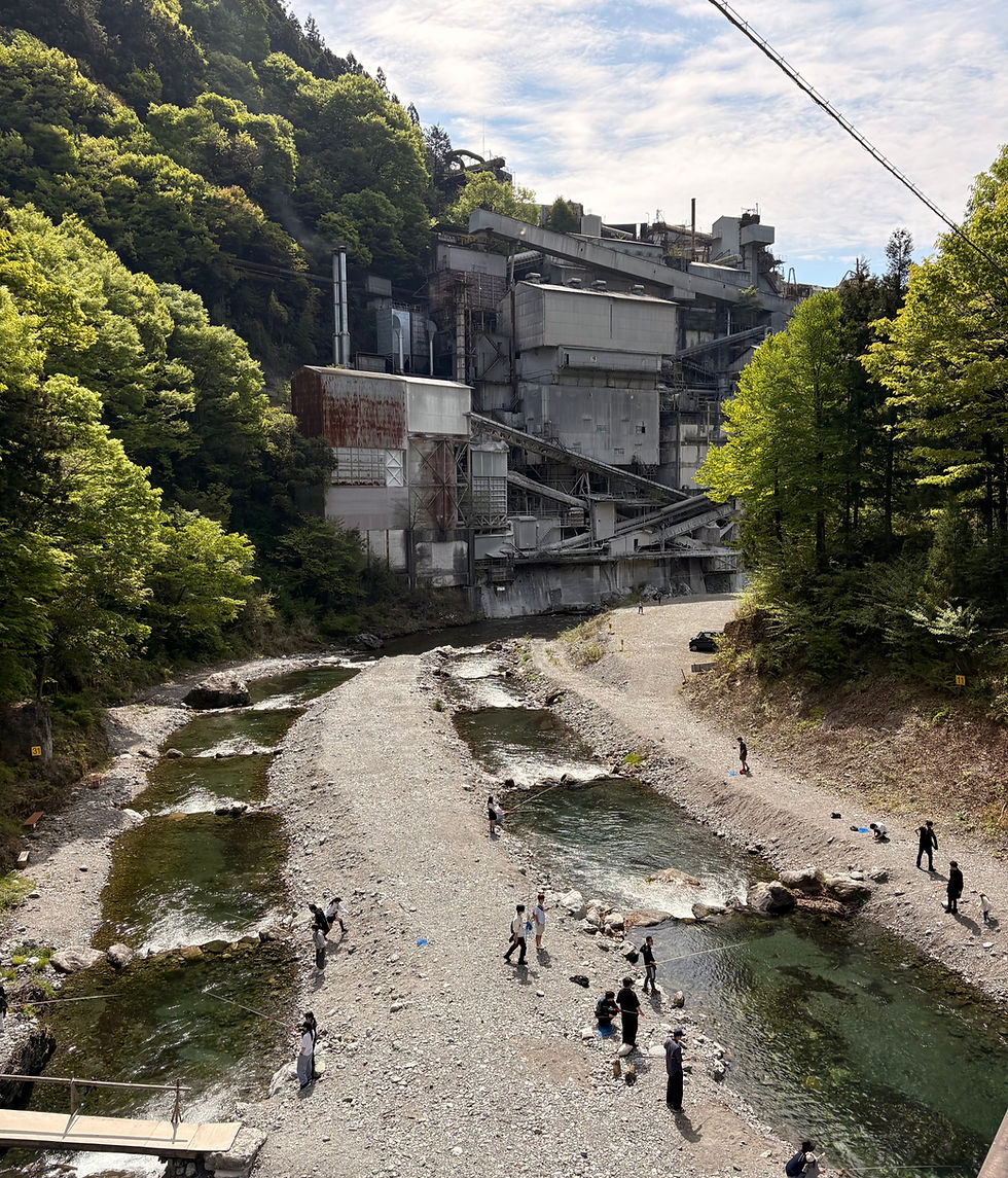 Check out this cool finishing spot with what looks like an old chemical plant in the background!