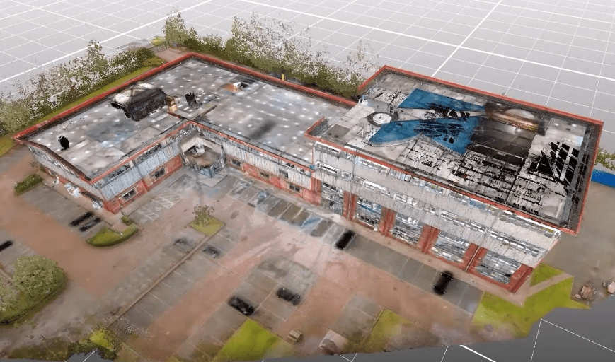 3D point cloud model of a commercial building and its surrounding site, captured using reality capture technology.
