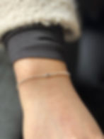 Permanent jewellery with charm