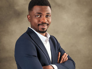 founder standing in front of a photoshoot