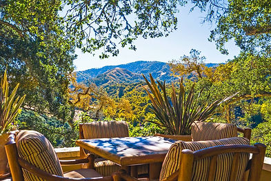 Live amongst the heritage oaks with redwood and ridgeline views, just a short stroll to the nature community's social heartbeat at The Preserves Ranch Club and 15 minutes to Carmel restaurants and schools. Enjoy year-around Mediterranean climate in the sun on this very private 53-acre property with recreation amenities and resident services at your fingertips, including a Tom Fazio Design, Top-100 Rated 18 hole golf course. This single-level 4 bedroom, 4.5 bath Spanish hacienda embraces indoor and outdoor living in the traditional courtyard, viewing deck and screened-in porch. Its seamlessly open living spaces in the central great room and kitchen are perfect for entertaining, while the more intimate master suite and guest wings provide privacy. The attached caretakers house with separate entrance is perfect for friends’ extended stays. Enjoy the sun and privacy in the oaks and relax by the fireplace after hiking or riding one of the many Santa Lucia Preserve trails.
