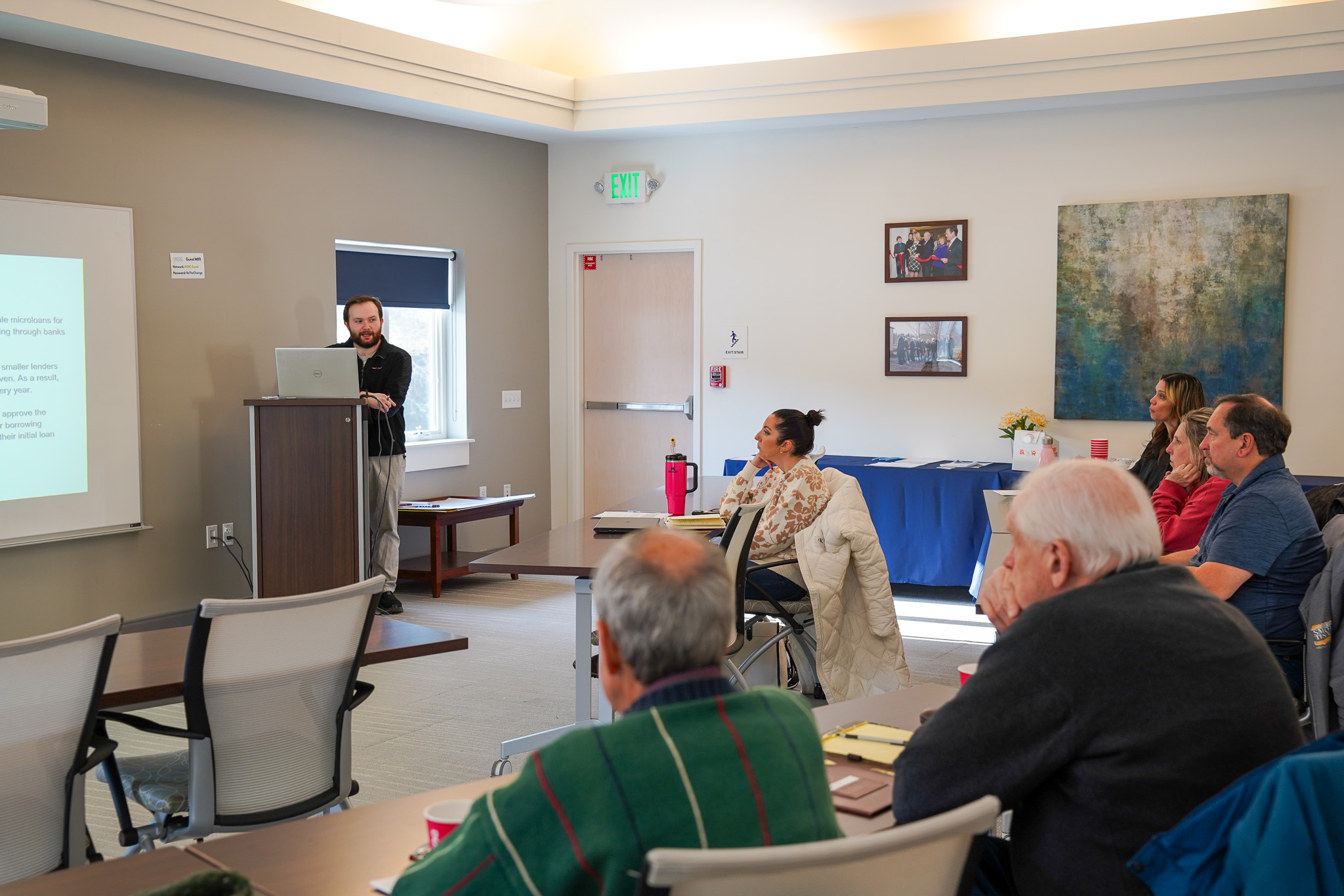 REDC Program Coordinator Adam Moaratty presenting to small business owners at REDC Training Center