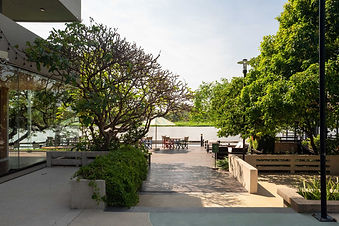 Garden pathway and outdoor relaxation terrace at RXV Wellness Village wellness retreat near Bangkok