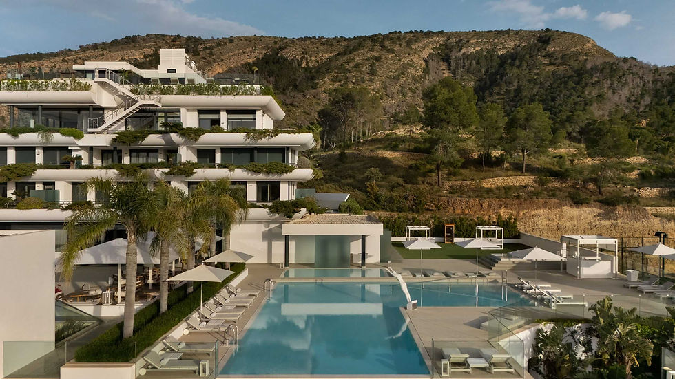 SHA Wellness Clinic exterior view with infinity pool and mountain backdrop in Alicante, Spain