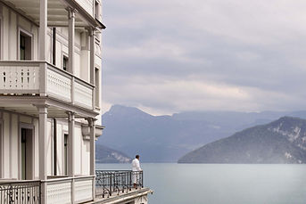 Lakefront wellness retreat in Switzerland with mountain views, specialising in stress management and holistic recovery retreats.