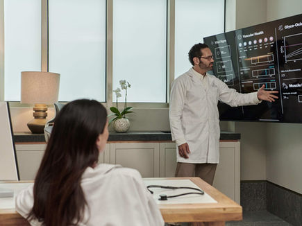 Personalised health consultation with interactive diagnostics screen at SHA Wellness Mexico