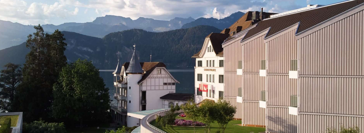 Chenot Palace Weggis surrounded by gardens and alpine scenery