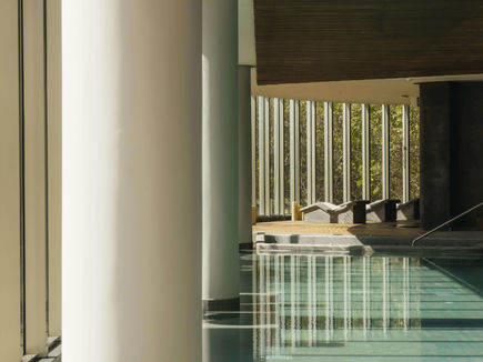 Indoor hydrotherapy pool at SHA Wellness Clinic Mexico with fluted stone columns