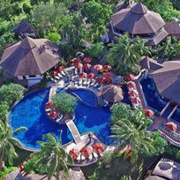 Aerial view of Mangosteen Ayurveda & Wellness Resort with tropical pool and villas in Phuket