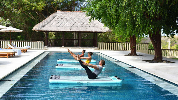 Aqua Pilates session in the pool at Revivo Wellness Resort Bali