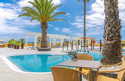 Outdoor swimming pool at Ondamar hotel within Galo Resort Madeira