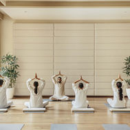 Group yoga session at Six Senses Vana