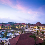 Resort aerial view at sunset with pool and landscaped gardens at Anantara Peace Haven Tangalle