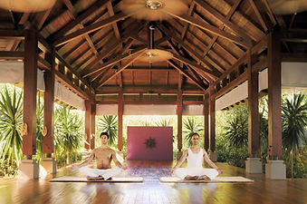 Morning yoga session inside the open-air pavilion at Shanti Maurice Resort & Spa Mauritius