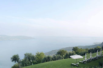 Lakefront garden with sun loungers at Lefay Resort Lago di Garda