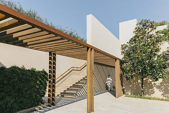 Modern architectural walkway leading to the wellness centre at Six Senses Vana in Dehradun, India