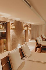 Relaxation lounge with daybeds at Lily of the Valley Hotel wellness centre