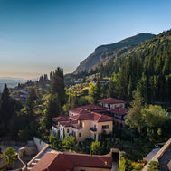 Euphoria Retreat from above, with the village of Mystras and Mount Taygetus behind