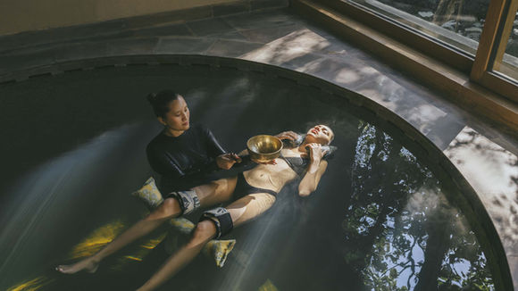 Deep relaxation during floating Watsu water therapy at Six Senses Vana wellness retreat in India