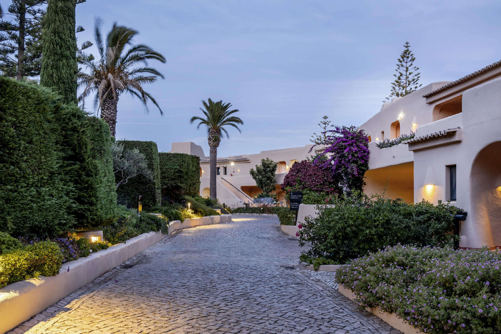 Pathway through landscaped gardens leading to the suites at Vilalara Grand Hotel Algarve.