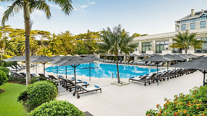 Palm trees by the poolside at Hotel Palácio Estoril Cascais Portugal