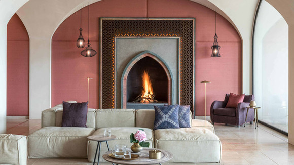 Cozy indoor lounge with fireplace at Euphoria Retreat
