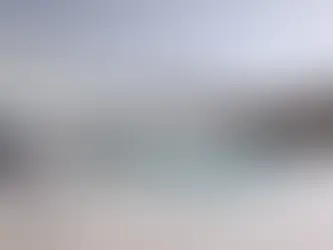 Outdoor swimming pool with sun loungers at Baobab Suites Tenerife