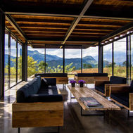 Lounge seating and mountain views in the main pavilion at Santani