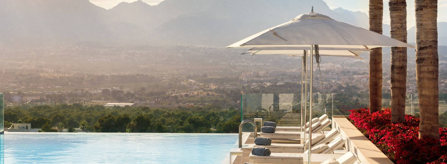 Infinity pool at SHA Wellness Clinic overlooking Spanish mountains