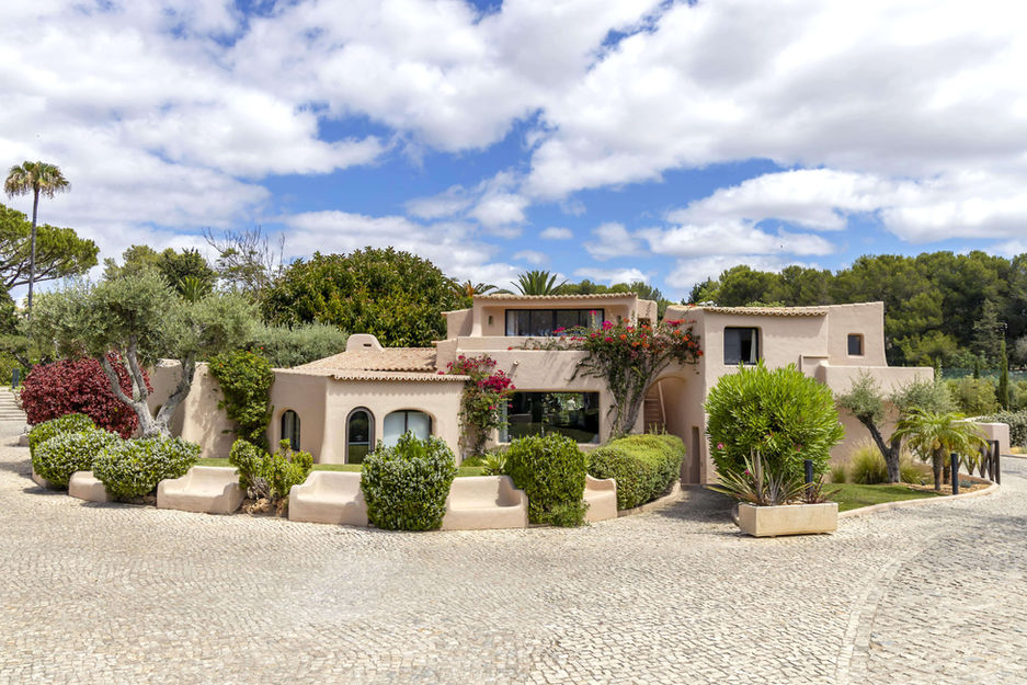 Exterior of Vilalara Grand Hotel Algarve showing Mediterranean-style architecture and gardens.