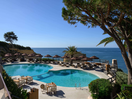 Pool with panoramic ocean views at Vilalara Grand Hotel Algarve.