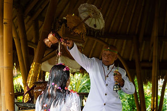 Water blessing ceremony with Balinese priest at Fivelements Retreat Bali