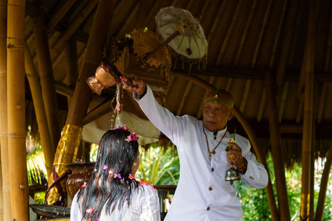 Water blessing ceremony with Balinese priest at Fivelements Retreat Bali