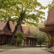 Traditional Thai architecture surrounded by gardens at RXV Wellness Village wellness retreat in Thailand