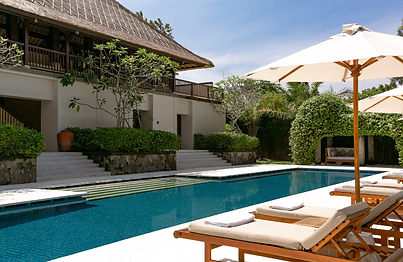 Luxury poolside sun loungers at Revivo Wellness Resort Bali