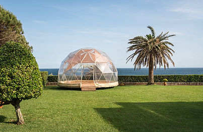 Transparent yoga dome overlooking the Atlantic Ocean on the hotel grounds