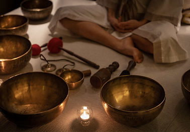 Tibetan singing bowls prepared for a meditative sound healing session.