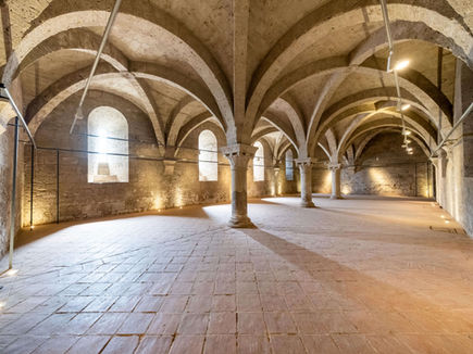 Historic cloister courtyard at Castilla Termal Monasterio de Valbuena with Gothic arches