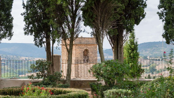 Manicured garden with views of Brihuega countryside at Castilla Termal hotel