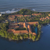 Breathtaking aerial view of Anantara Kalutara Resort surrounded by ocean and lagoon