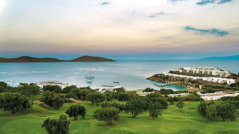 Beachfront resort in Crete with serene sea views, an ideal setting for stress management and recovery retreats for wellbeing escapes.