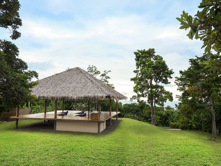 Open-sided yoga shala nestled in nature at Absolute Sanctuary in Koh Samui