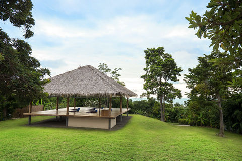Open-sided yoga shala nestled in nature at Absolute Sanctuary in Koh Samui
