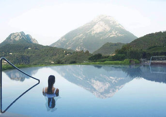 Italian sleep enhancement retreat on Lake Garda with hillside and olive grove views for improved rest.