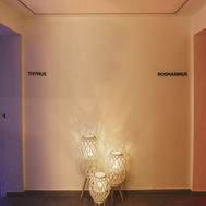 Wellness corridor leading to treatment rooms at Longevity Health & Wellness Hotel