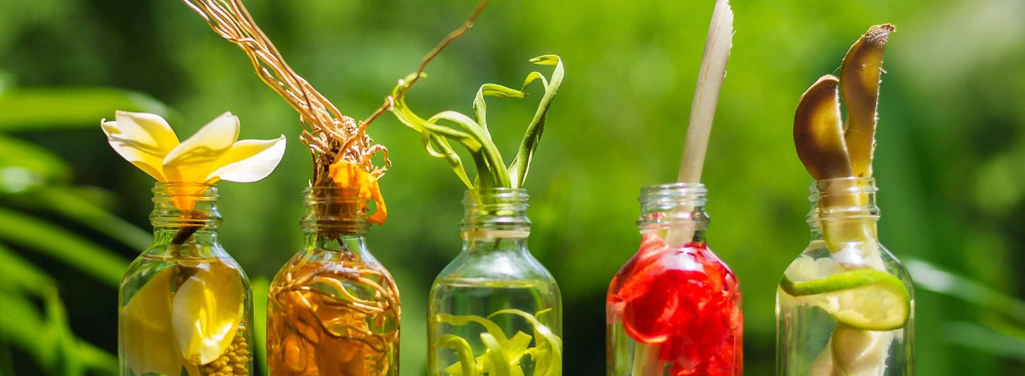 Ayurvedic herbal oils used in wellness treatments at Fivelements Retreat Bali