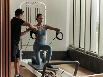 Private reformer Pilates class at SHA Wellness Clinic Mexico with instructor support