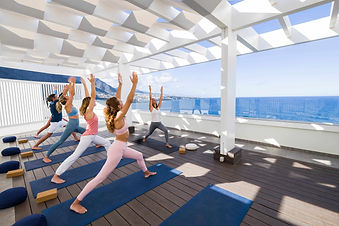 Yoga session on the rooftop terrace at Océano Health Spa Hotel with Atlantic views, part of the Yoga Escape programme