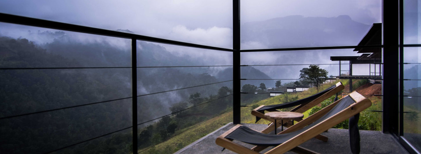 Private suite balcony with mountain views at Santani Wellness Resort in Sri Lanka.